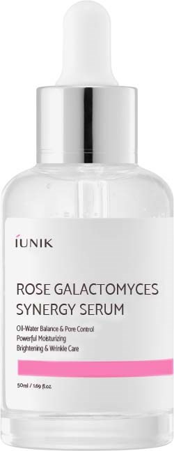  Kirkas pullo tiputta, jossa labeli IUNIK Rosé Galactomyces Synergy Serum, ja pinkki raita.
