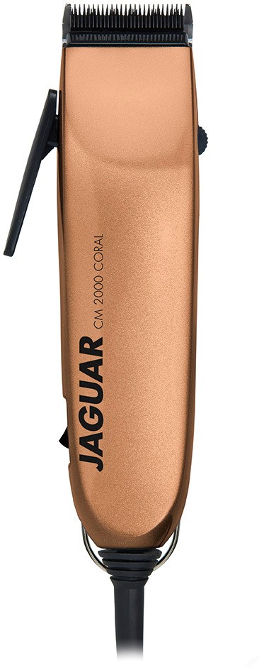 A hair clipper with a metallic beige body, black control button, and cord. The brand 'JAGUAR' is on it.