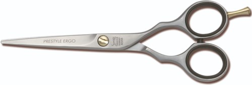 Ett par saxar med metallblad och svarta handtag, märkt 'PRESTIGE ERGO' på bladen.
