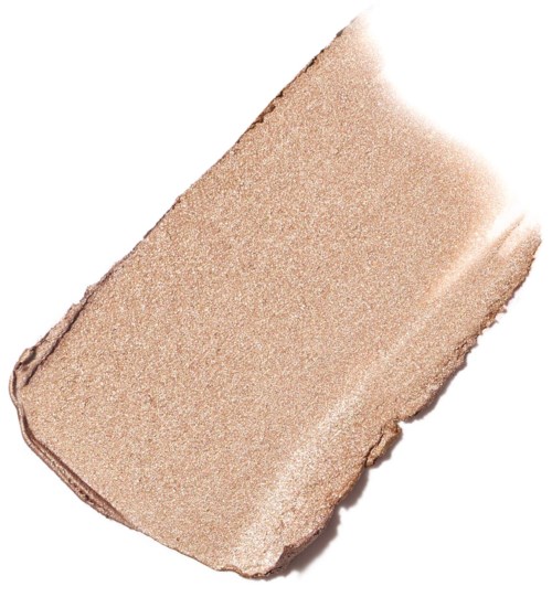 A swatch of beige or light tan makeup or foundation, smooth and slightly shimmery.
