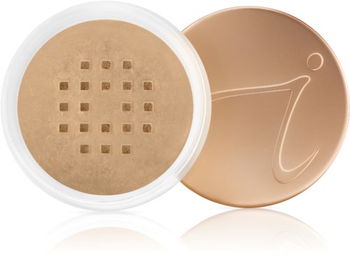 Ett beige pulver i en rund behållare, med locket som visar en liten 'i'-symbol.