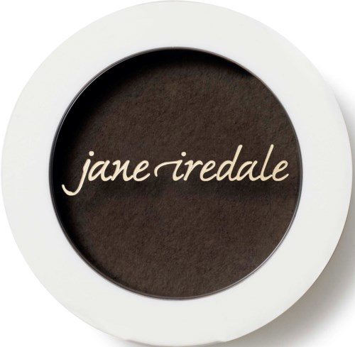 A white circular container with dark interior, with the name 'jane iredale' in cursive on the lid.