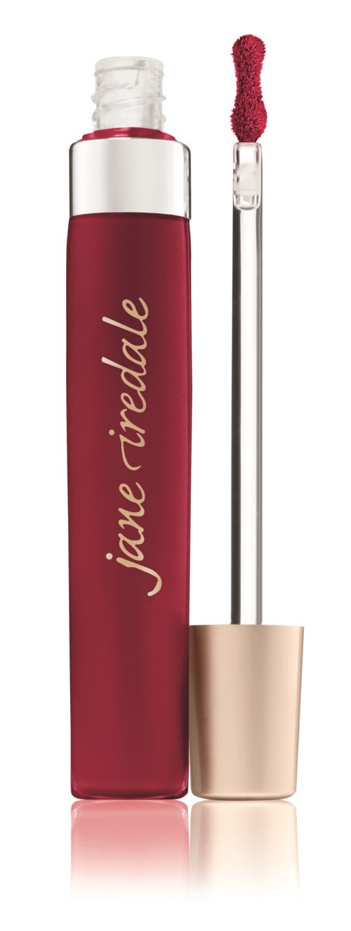 Punainen huulten kiilleputeli kullanvärisellä korkilla, jossa on aplikaattori ja brändin nimi "jane iredale".