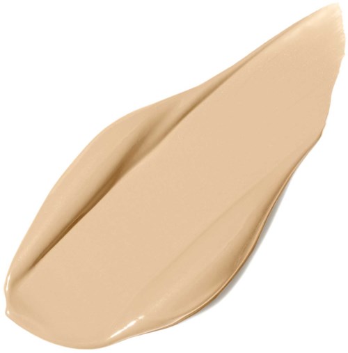 En beigefärgad kräm som smutsats på en vit bakgrund, liknar foundation eller makeup.