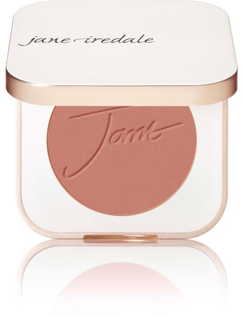 A blush compact with a rose-colored cosmetic product and "Jane Iredale" written on the lid and inside.