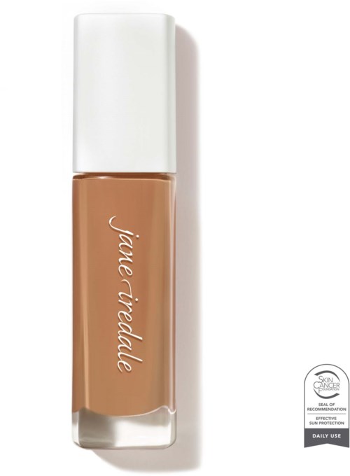 A beige liquid foundation bottle with a white cap and 'jane iredale' written on it.