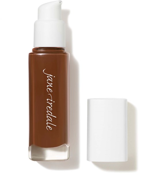 A brown bottle with a white pump and cap, labeled 'jiale ridalle', placed on a white surface.