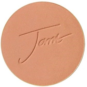 En rund makeup-compact med märket 'Tarte' inristat på ytan.