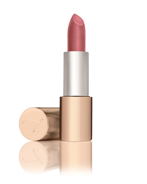 Et rosa leppestift i en hvit og gullfarget tube, med lokket avtent. Leppestiftet er litt bøyd.