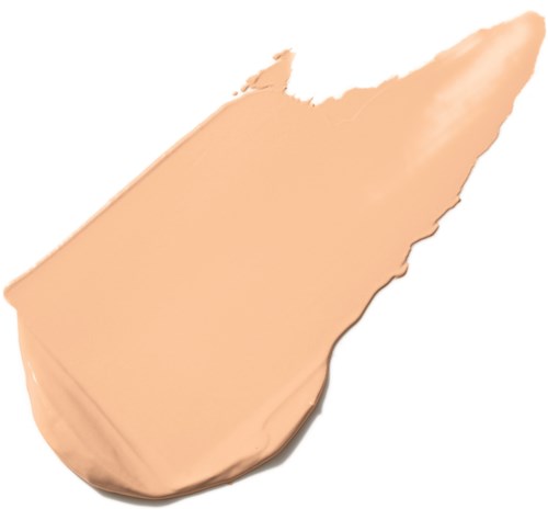 En beige, oregelbundet formad fläck, möjligen makeup eller färg, på en vit bakgrund.