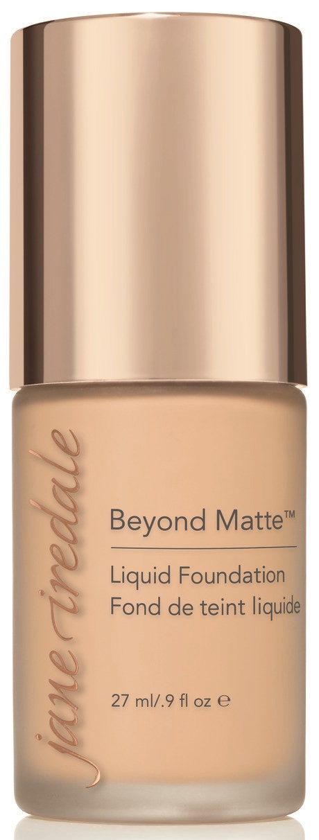 En flaska med Joie Perfectie Beyond Matte flytande foundation med beige kork och etikett.