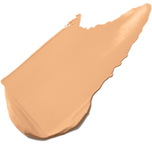 Krämig foundationprov med en jämn, rund form och ljusbeige färg.