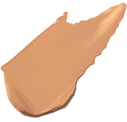 En beige makeup- eller foundationsmula med spetsig ände. Den ser slät och krämig ut.