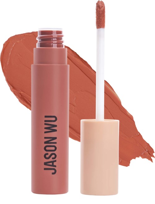 Een lippenstift met een roze tint, zonder dop, met applicator en proefstukje. Het merk is Jason Wu.