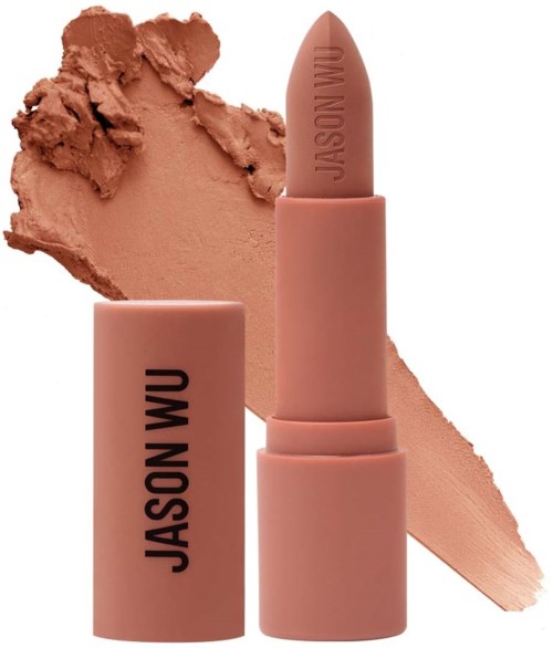 A nude-colored lipstick with brand name "JASON WU" on the case, and a smear of matching lipstick background.