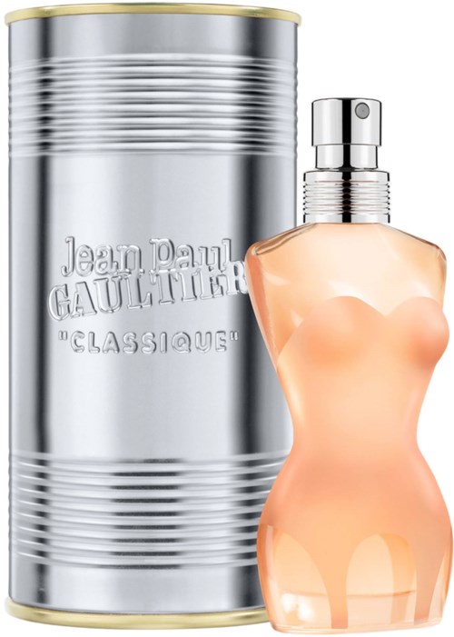 Perfumowar w kształcie kobiety, z metalowym pojemnikiem w tle, oznaczony Jean Paul Gaultier.