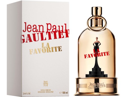 Parfyymipullo ja laatikko Jean Paul Gaultier La Favorite -tuoksulle, figuuri askeleiden päällä. Pullo on kultainen ja pyöreällä kullanvärisellä korkilla.