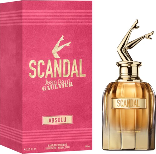 En parfymeflaske med gullhode og ben som stikker ut, ved siden av en rosa boks merket Scandal Absolu.