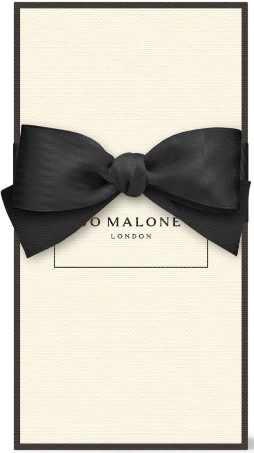 A white gift box with a black bow, and the name 'Jo Malone London' on it.