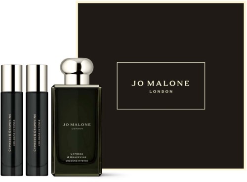 Jo Malone London perfume bottle and packaging with logo on black background.