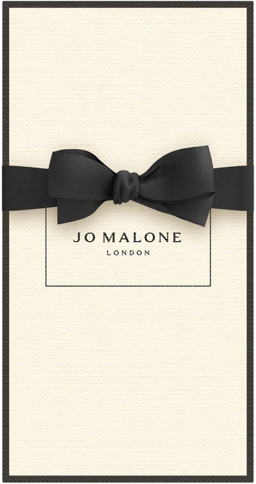Elegant wit doosje met zwart lint en strik, met Jo Malone London-logo.