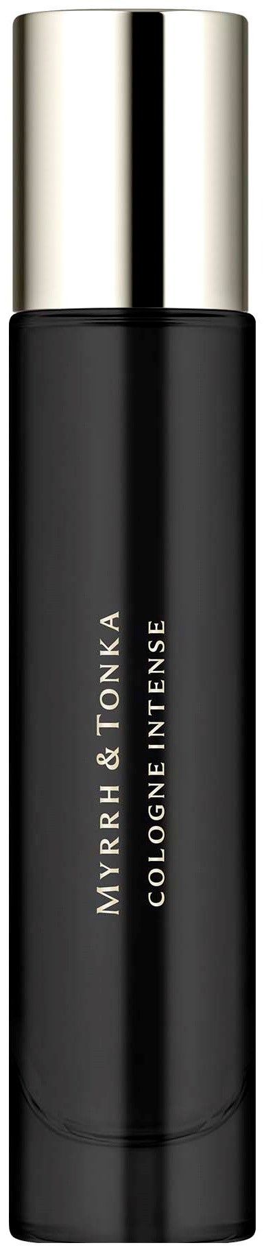 En svart cylindrisk flaska med silverlock och märkning 'MYRRH & TONKA COLOGNE INTENSE'.