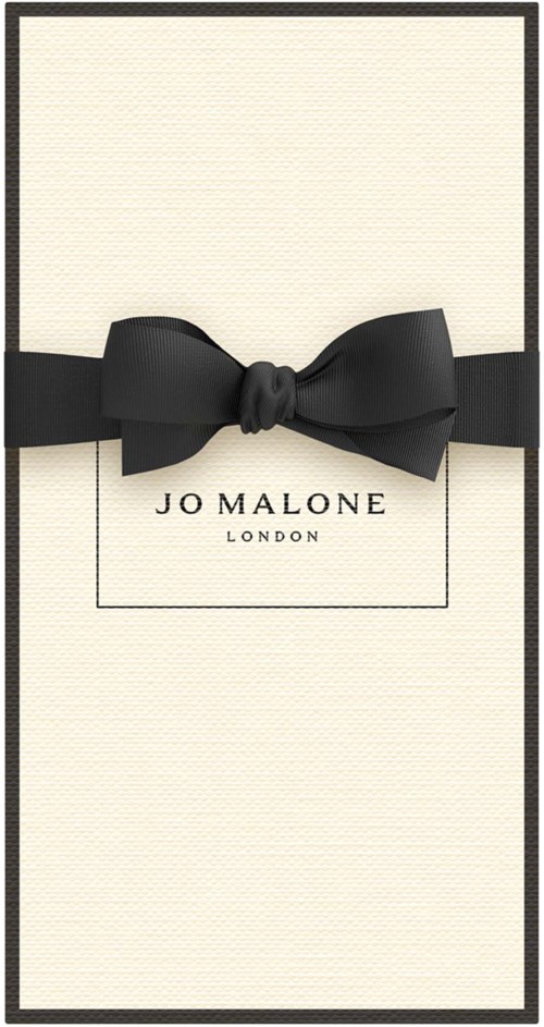 A white gift box with a black ribbon and bow, labeled 'Jo Malone London' in the center.