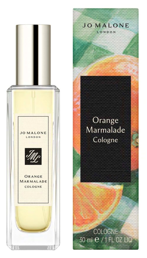 A perfume bottle and box with orange illustrations and green leaves, labeled Orange Marmalade Cologne by Jo Malone London.