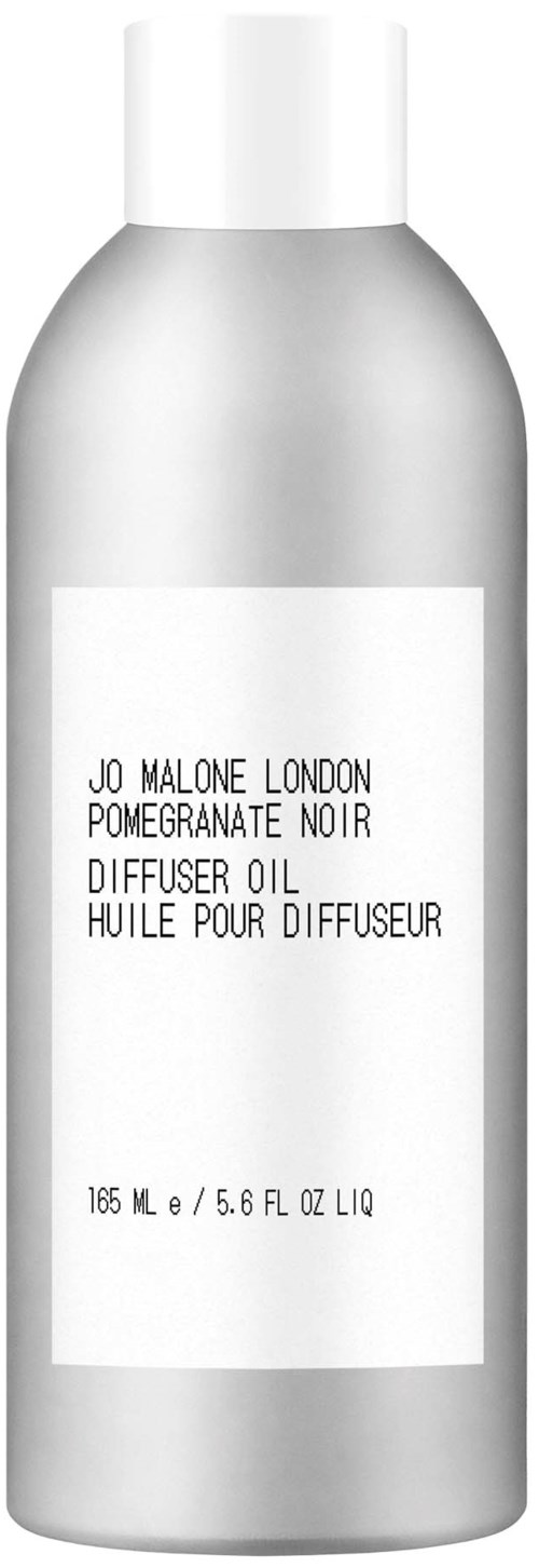A silver bottle of Jo Malone London Pomegranate Noir diffuser oil with a white cap and label.