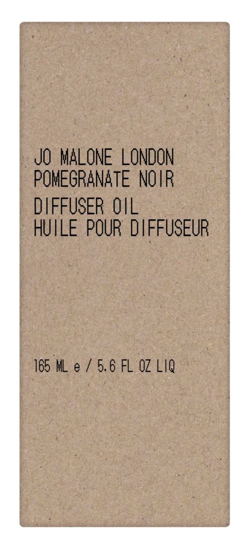 A beige box labeled with black text, mentioning Jo Malone London, pomegranate noir, and diffuser oil.