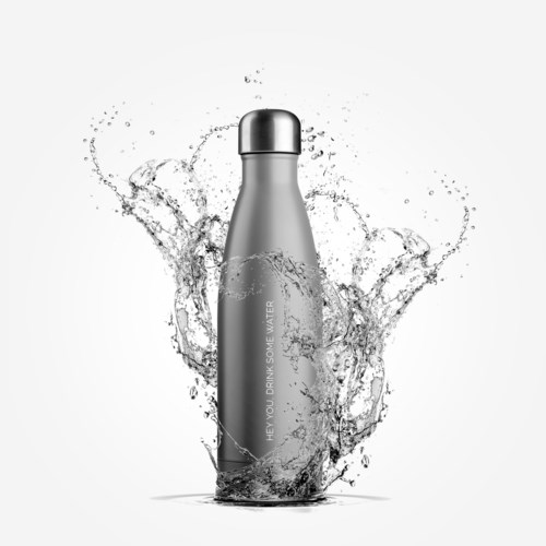 A silver water bottle surrounded by splashing water, with text down the side and a metallic cap.