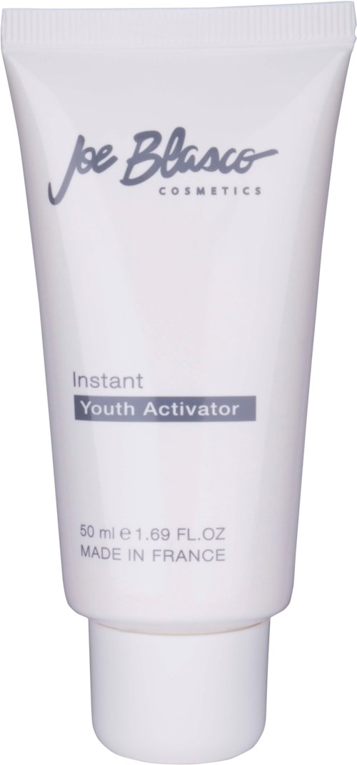 En hvid tube med Joe Blasco Cosmetics Youth Activator-creme med tekst på.