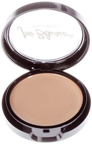 A compact powder case with an open mirror, showing beige pressed powder inside.