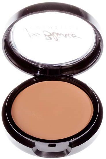 A compact round makeup powder case with beige powder inside and a mirror on inside of lid.