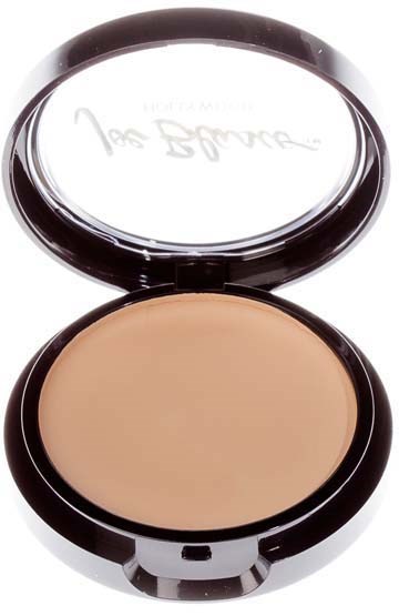 A compact with beige pressed powder and a clear mirror inside the lid.