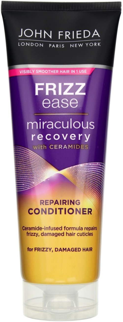 En tube med John Frieda Frizz Ease miraculous recovery balsam for skadet, bustete hår, med ceramider. Fargene er lilla og gul.
