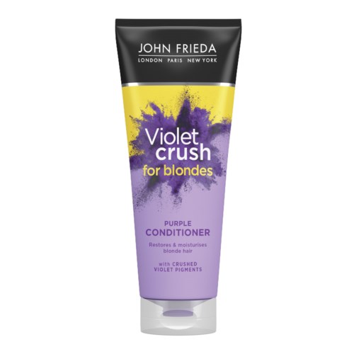 En hårbalsamflaska märkt 'Violet Crush for blondes' med lila och gul färgdesign och beskrivning av återfuktande egenskaper.