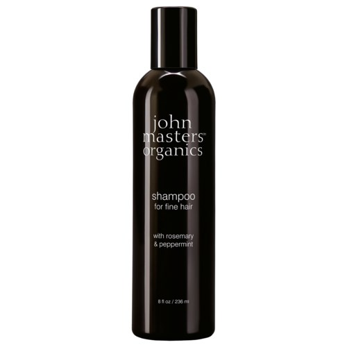 En svart flaska märkt 'John Masters Organics schampo för fint hår med rosmarin och pepparmint.'