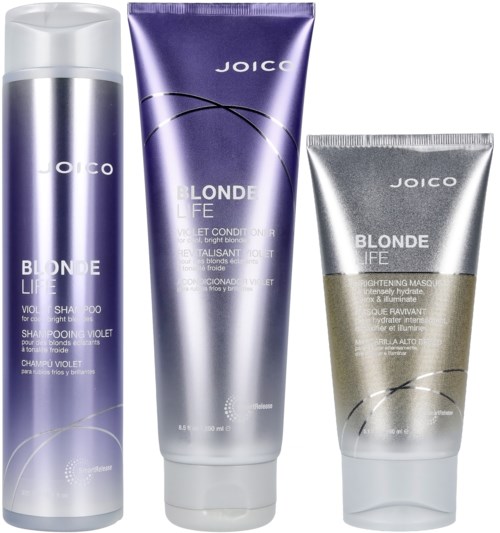 Tre hårvårdsprodukter i lila, silver och beige tuber och flaskor från Joico Blonde Life-serien.