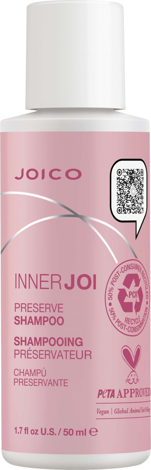 Pink flaske merket 'Joico Inner Joi Preserve Shampoo' med et hjerte og PETA-godkjenning merket.