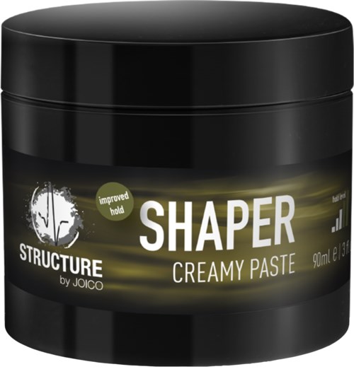 En svart burk med Shaper Creamy Paste hårprodukter, med en etikett som visar varumärke och beskrivning.