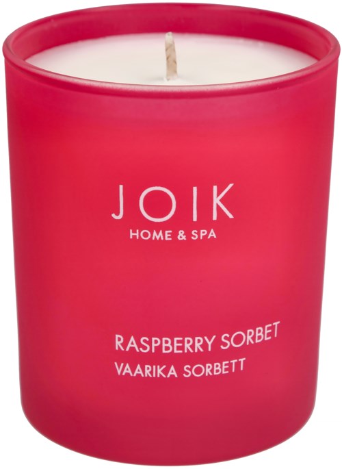 Różowa świeca z białym woskiem i małym knotem. Na etykiecie pisze 'JOIK HOME & SPA', 'Raspberry Sorbet'.