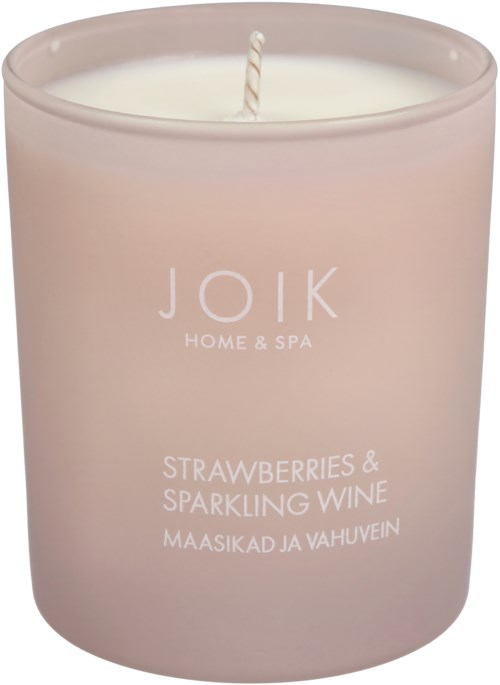 Różowa świeca z napisem 'Joik Home & Spa' i zapachem 'Truskawki i Musujące wino' po angielsku i estońsku.