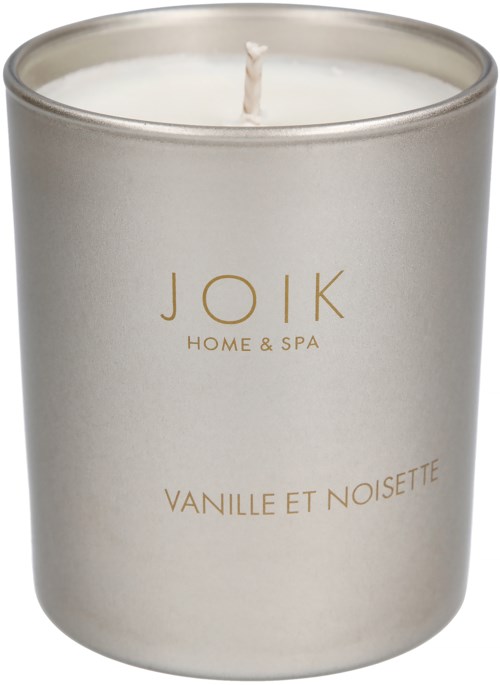 Biała zapachowa świeca z srebrnym wieczkiem i napisem 'JOIK HOME & SPA Vanille et Noisette'.
