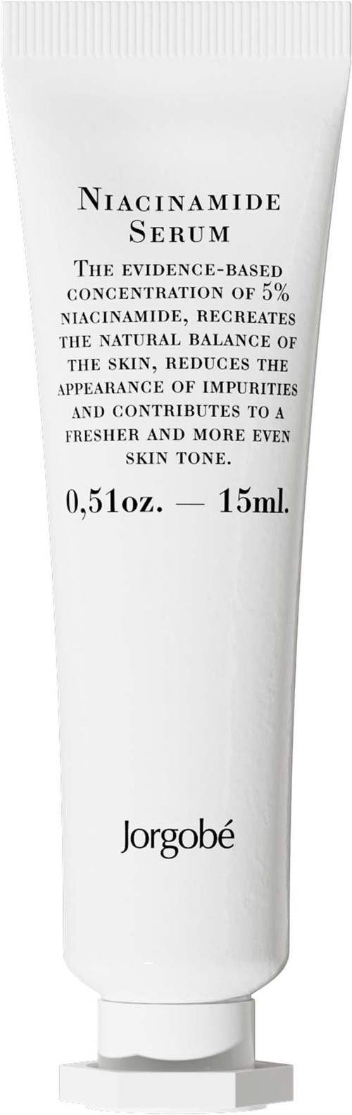 En vit tub med Niacinamide serum från Jorgobé med svart text som beskriver hudfördelar och produktstorlek.