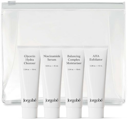 Four skincare tubes labeled with different product names, inside a transparent bag.