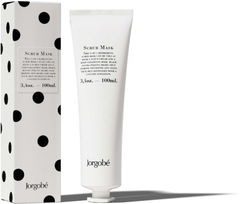 En vit tub med skrubbmaskin med svart text och en polkadot-box bredvid.