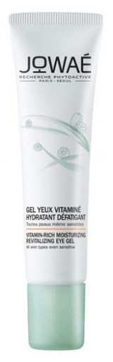 En hvit tube med IOWAÉ vitaminrik fuktighetsgivende gel, grønt design og svart tekst.