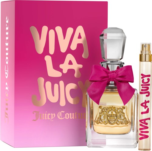 En parfume flaske med en pink sløjfe og Juicy Couture logo, foran en pink æske med samme logo.