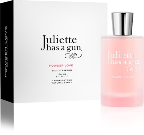 En parfymflaska och box med text om Juliette has a gun Powder Love doft.